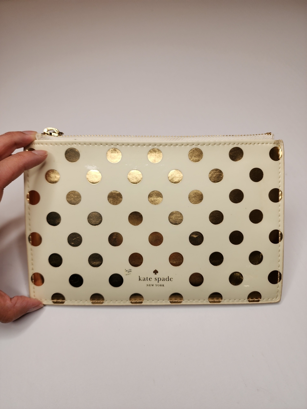 kate spade Cream Pouch with Gold Polka Dots